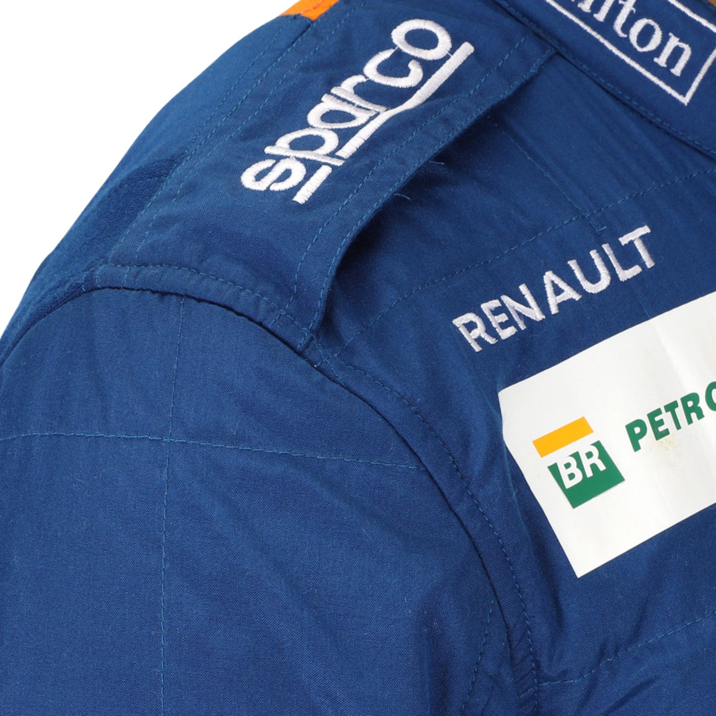 close up view of shoulder of Lando Norris 2019 F1 racing suit – youthful and sleek design with race-day styling