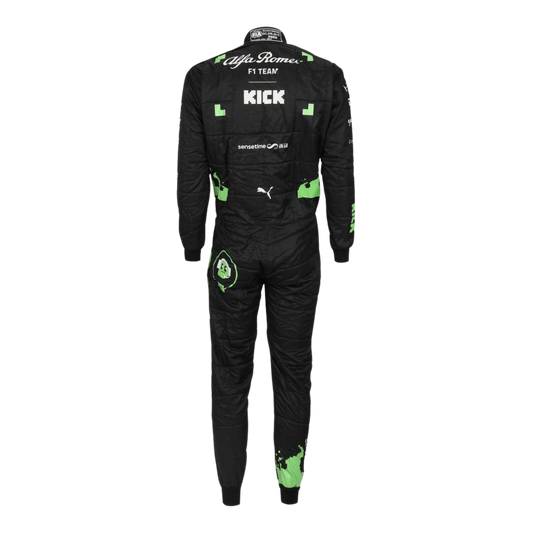 Rear view of Zhou's 2023 Belgian Grand Prix racing suit displaying the continuation of the black, red, and bright green color scheme with prominently placed sponsor logos and aerodynamic paneling.