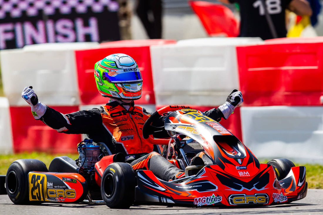 "Young kart driver celebrating victory