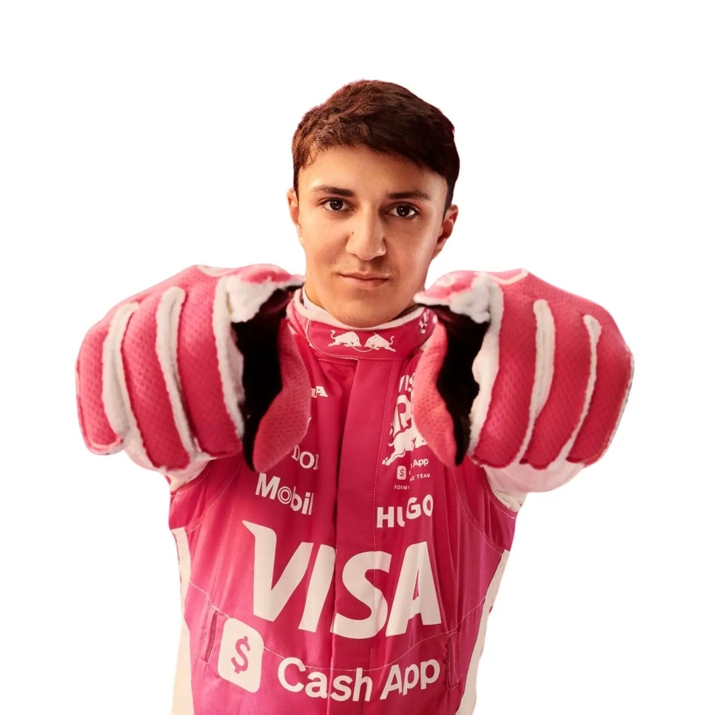 Isack Hadjar posing in his 2025 F1 race suit before the Miami Grand Prix, looking composed and race-ready.