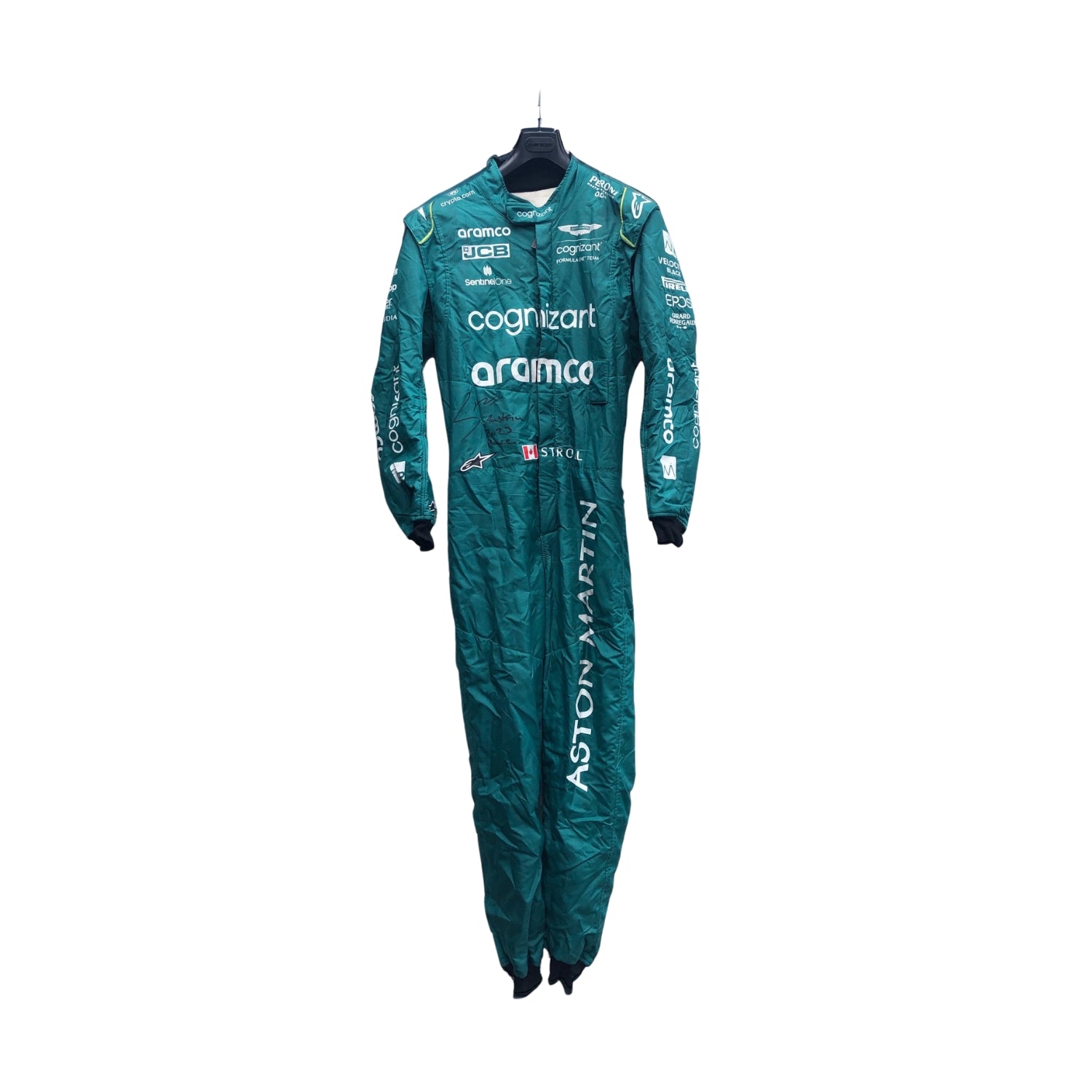 Lance Stroll’s 2023 Miami GP F1 racing suit, featuring a sleek design with a blend of dark green and subtle yellow accents. The suit is adorned with sponsor logos across the chest and shoulders, signifying high performance and innovation.