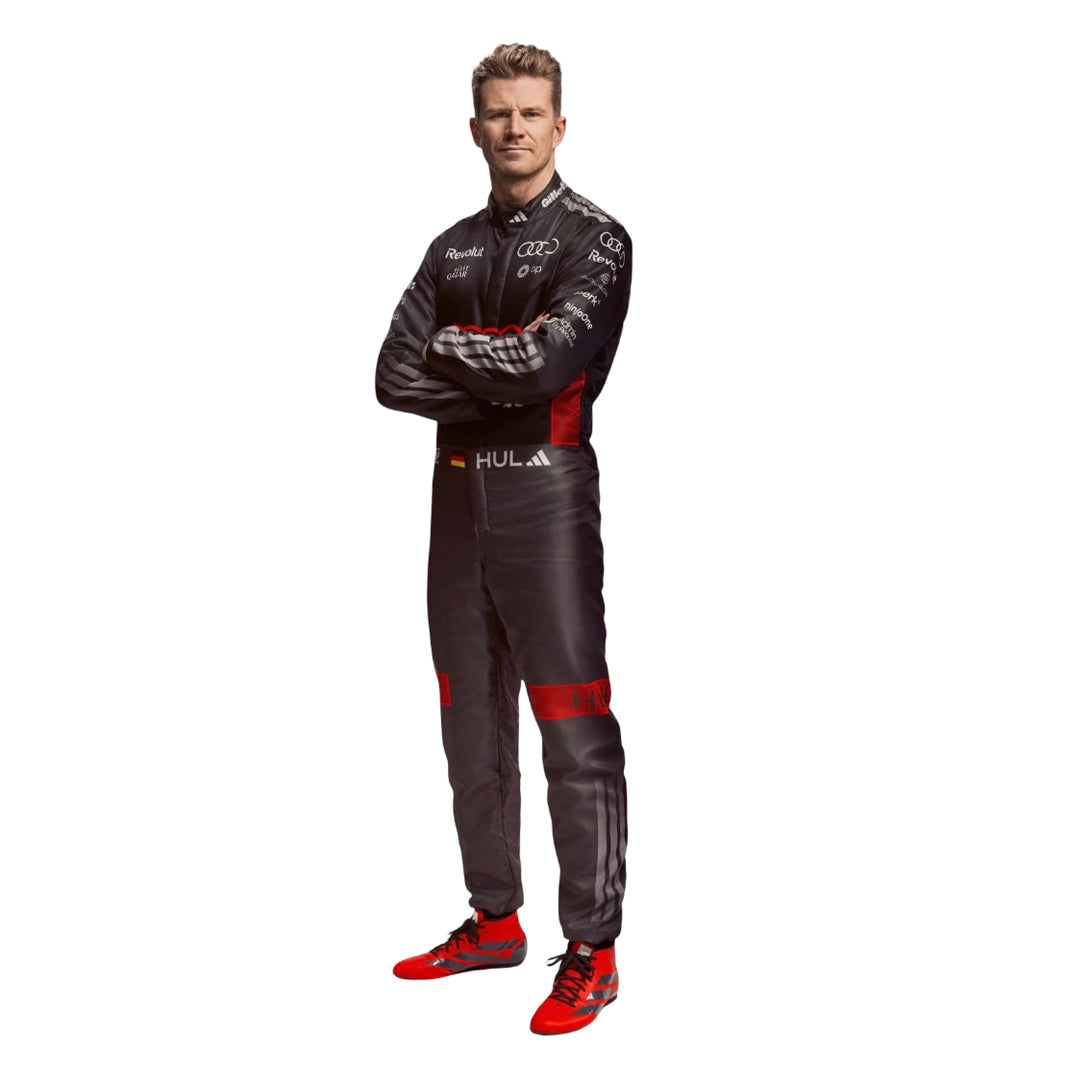 Nico hulkenburg in his 2026 f1 racing suit, showcasing the front design with distinctive color accents. speedxgear